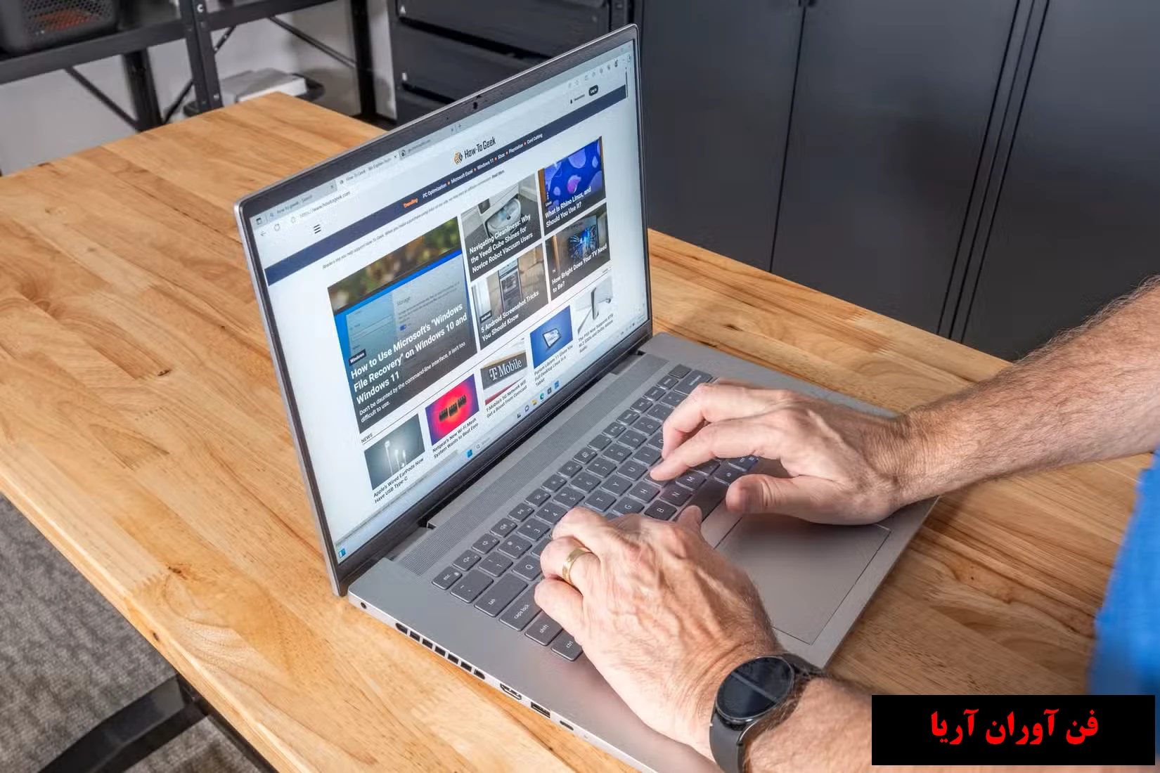 شخصی که روی لپ تاپ Dell Inspiron 16 Plus 7630 تایپ می کند.