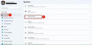"System" و "Power & Battery" در تنظیمات برجسته شده اند.
