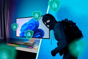 یک دسکتاپ ویندوز در سمت چپ با چندین سپر امنیتی در اطراف آن و یک دزد در سمت راست.